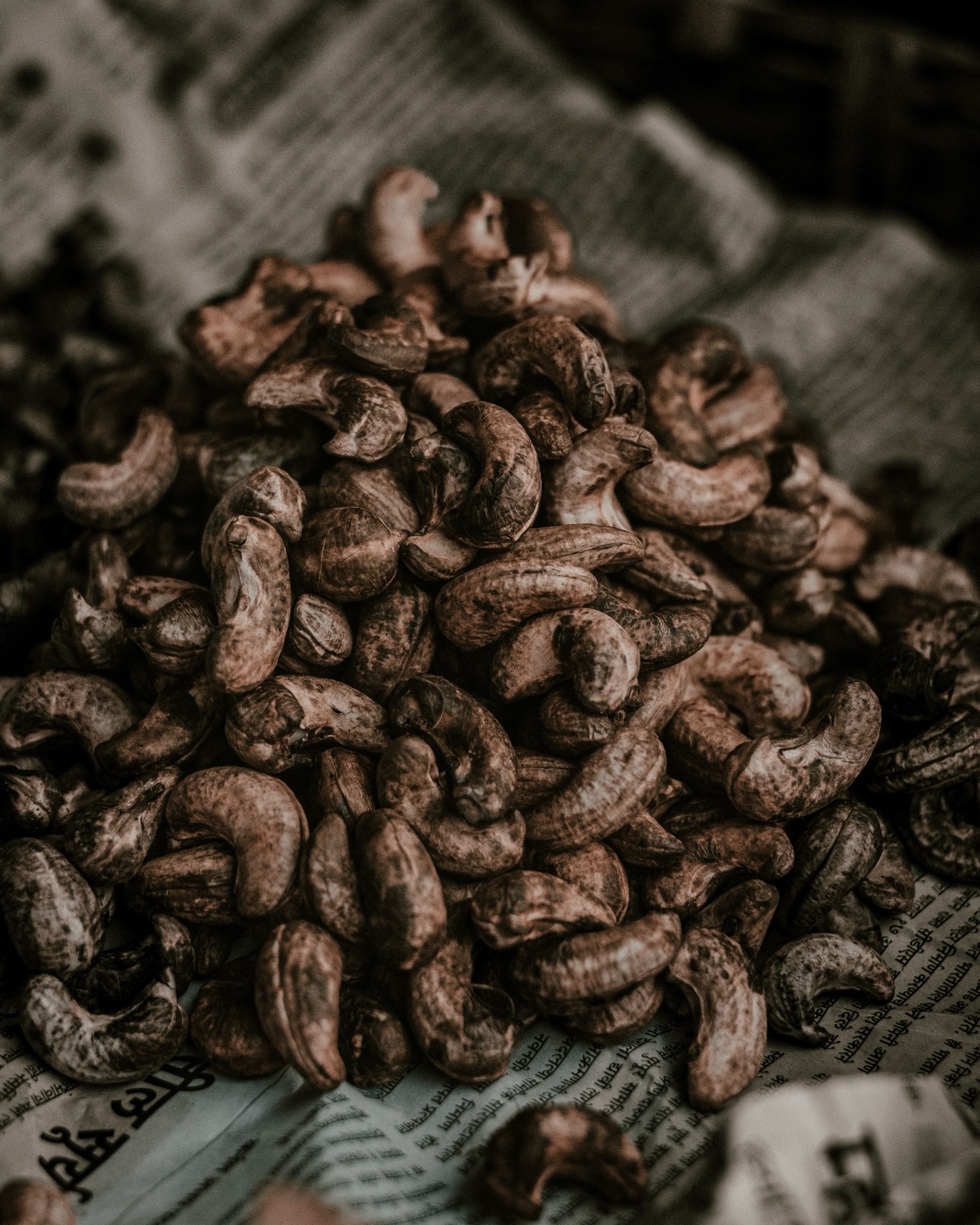 Raw cashew nuts in shell, close up